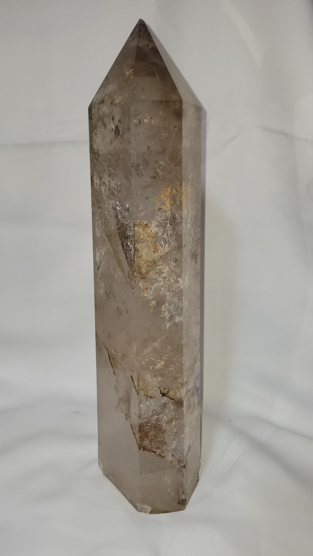Large clear Quartz gemstone tower