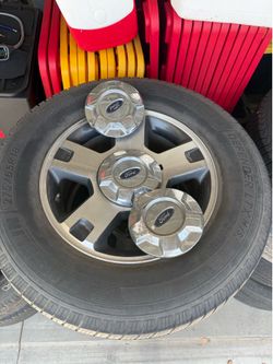 Lot of Used Ford and Jeep Tires with Rims