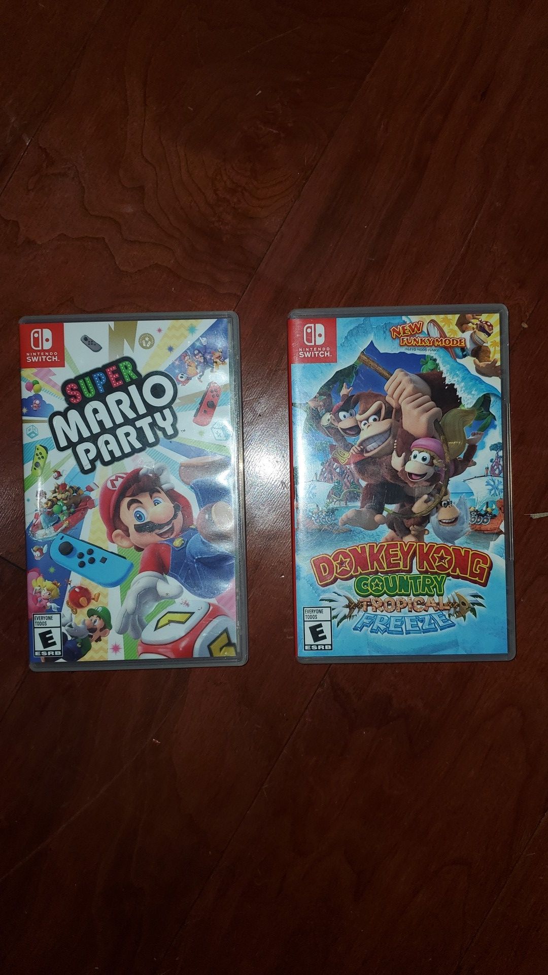 two games of Nintendo switch Donkey Kong country Super Mario Party