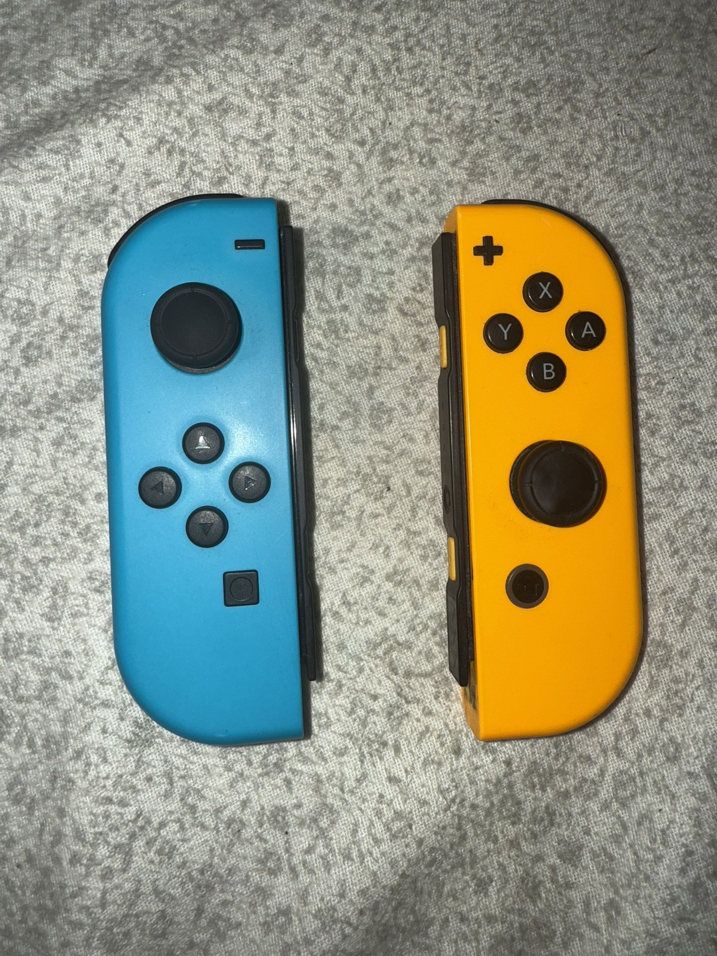 Used Set Of Nintendo Joy-Cons (Blue-Left, Orange-Right)