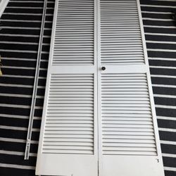 White double bifold closet doors