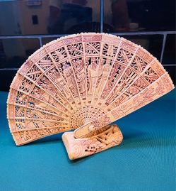 Vintage hand carved Ox Bone fan depicting the 8 Immortals