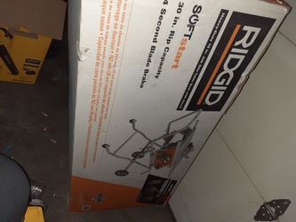 Ridgid table saw with stand new