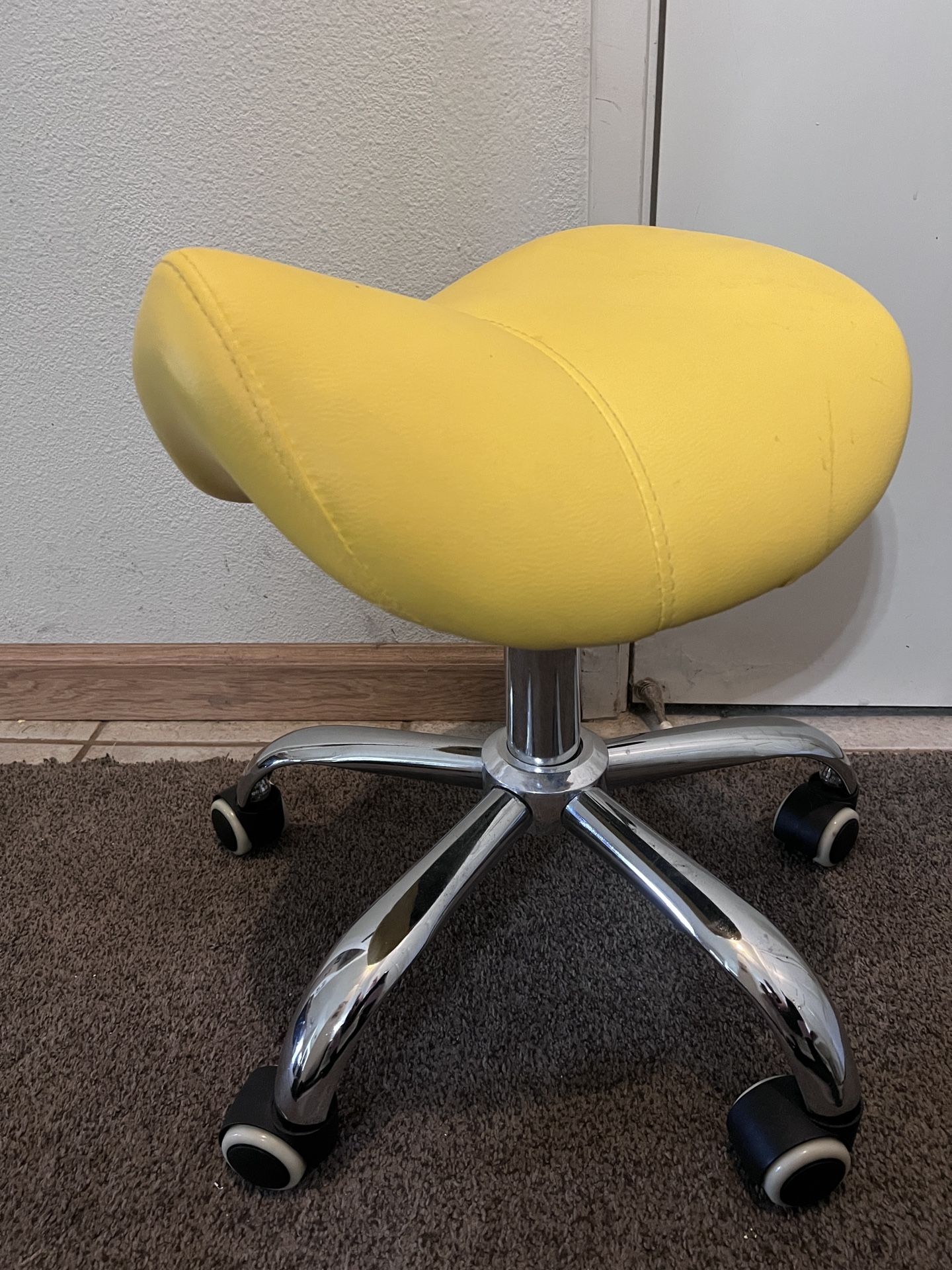 Adjustable Saddle Seat Rolling Stool