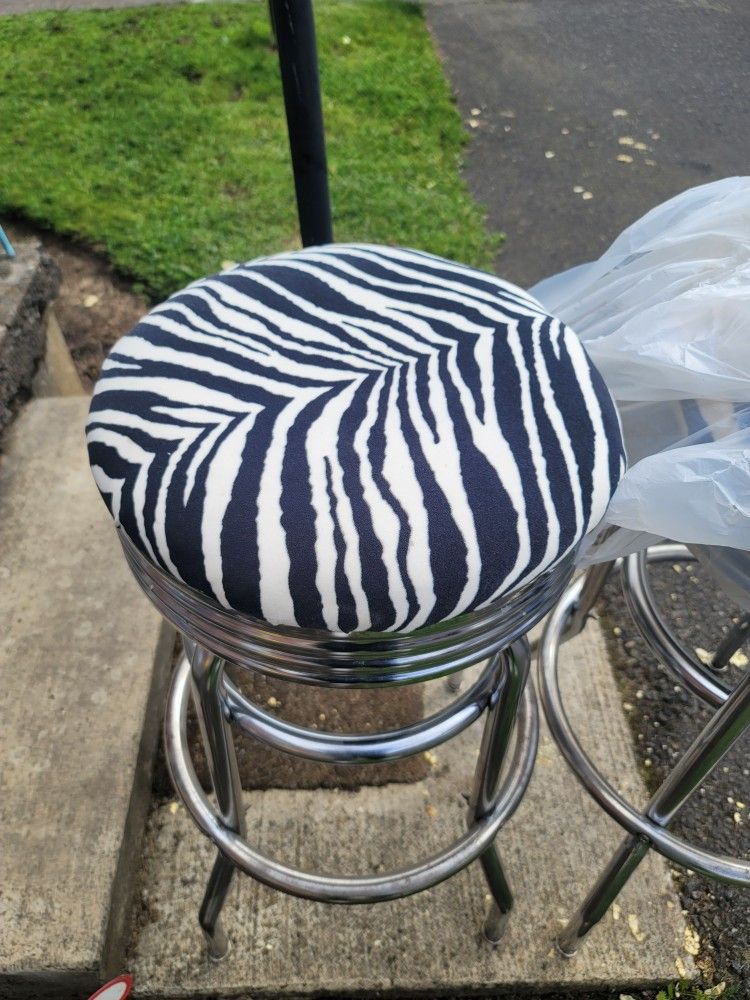 Two Chrome Zebra Print Swivel Stool