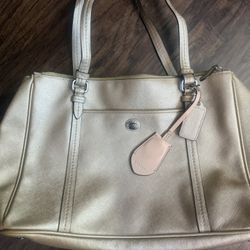 Gold Coach Handbag