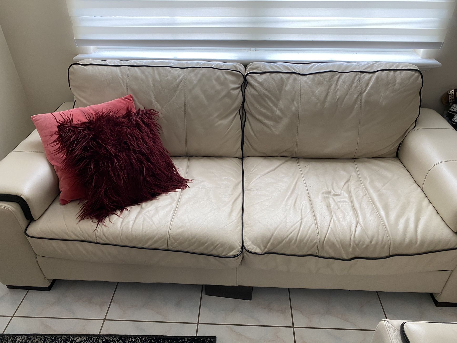 2 Sofas And Ottoman