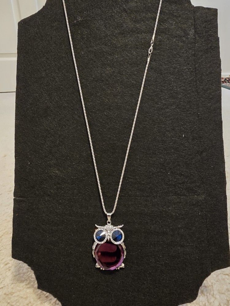 Gorgeous crystal owl pendant with a complentary change