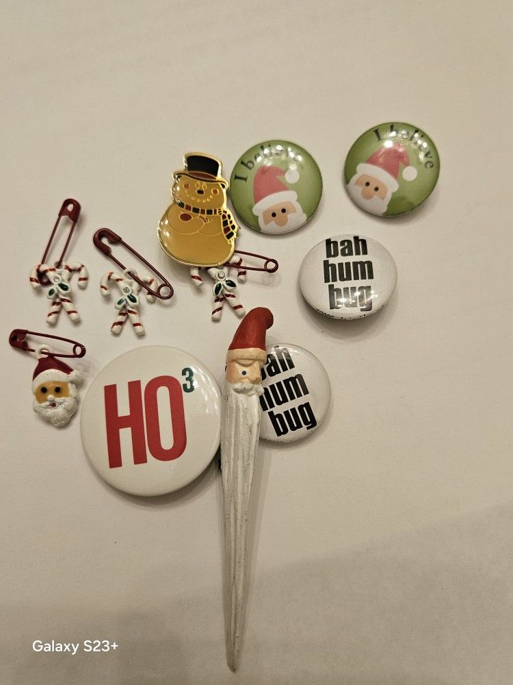 Collection of holiday pins Dept 56 Santa