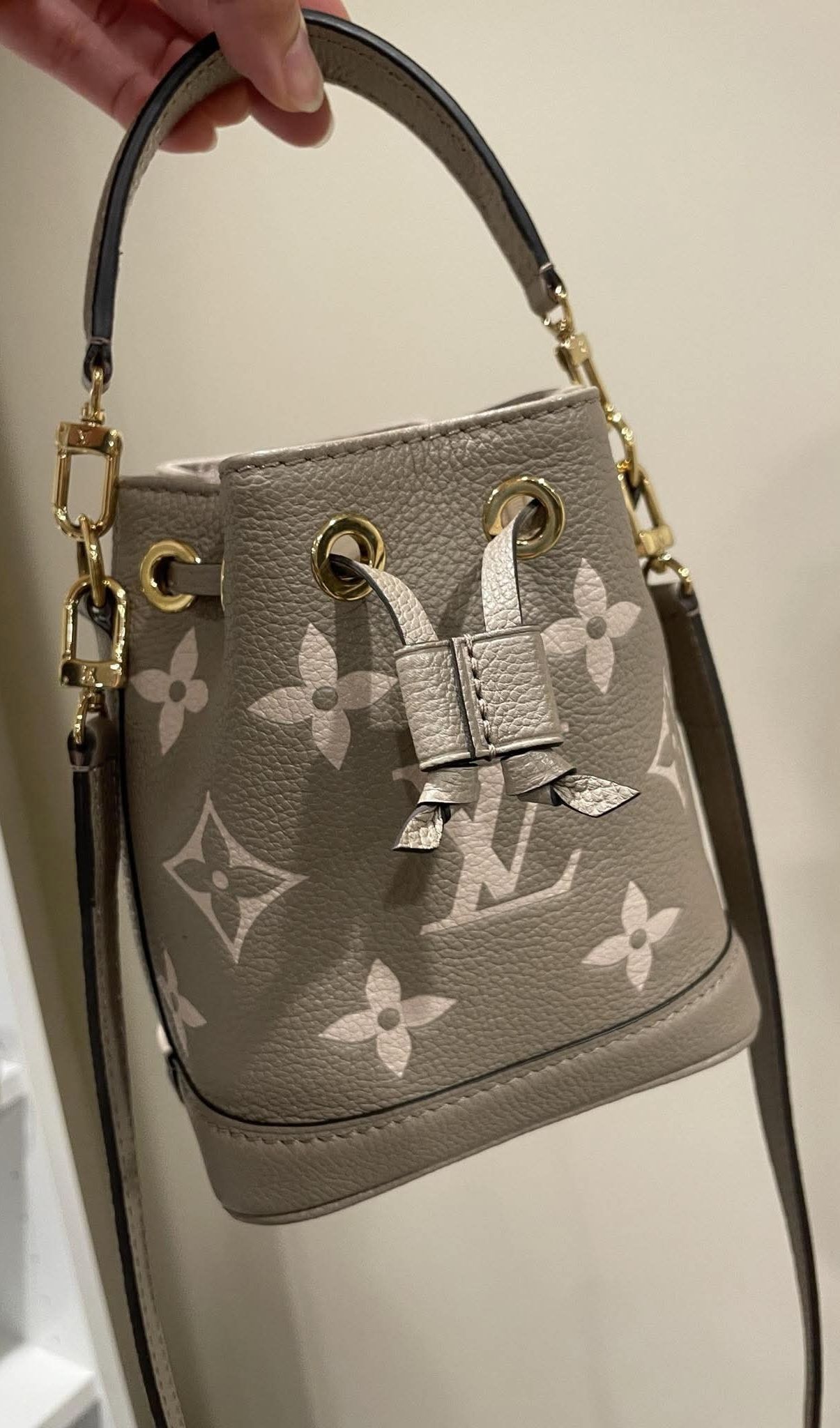 Authentic Louis Vuitton Nano Noe Empreinte in Dove Cream