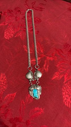 Native America stealing Silver with turquoise