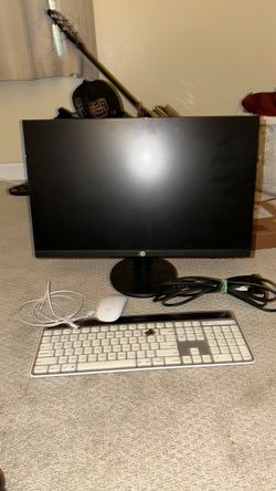 HP monitor and Logitech keyboard includes apple mouse and accessories