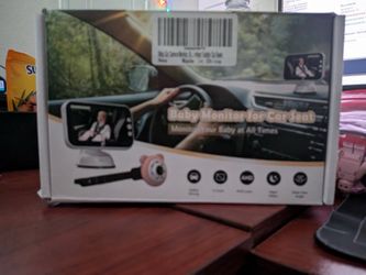 white baby car monitor