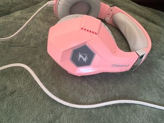 Used pink headphones light up