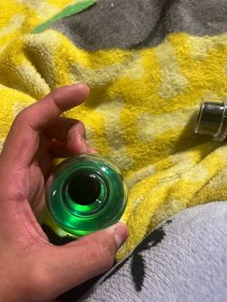 Green Liquid Glass Bottle with Metal Cap