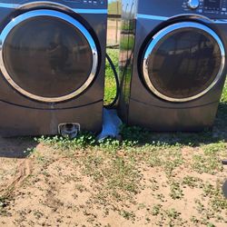 40 Dollars. Slightly Weathered General Electric Washer  and Dryer 