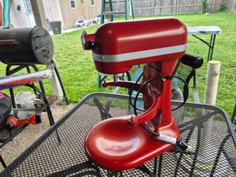 Nice Used red Kitchenaid mixer.  No accessories.