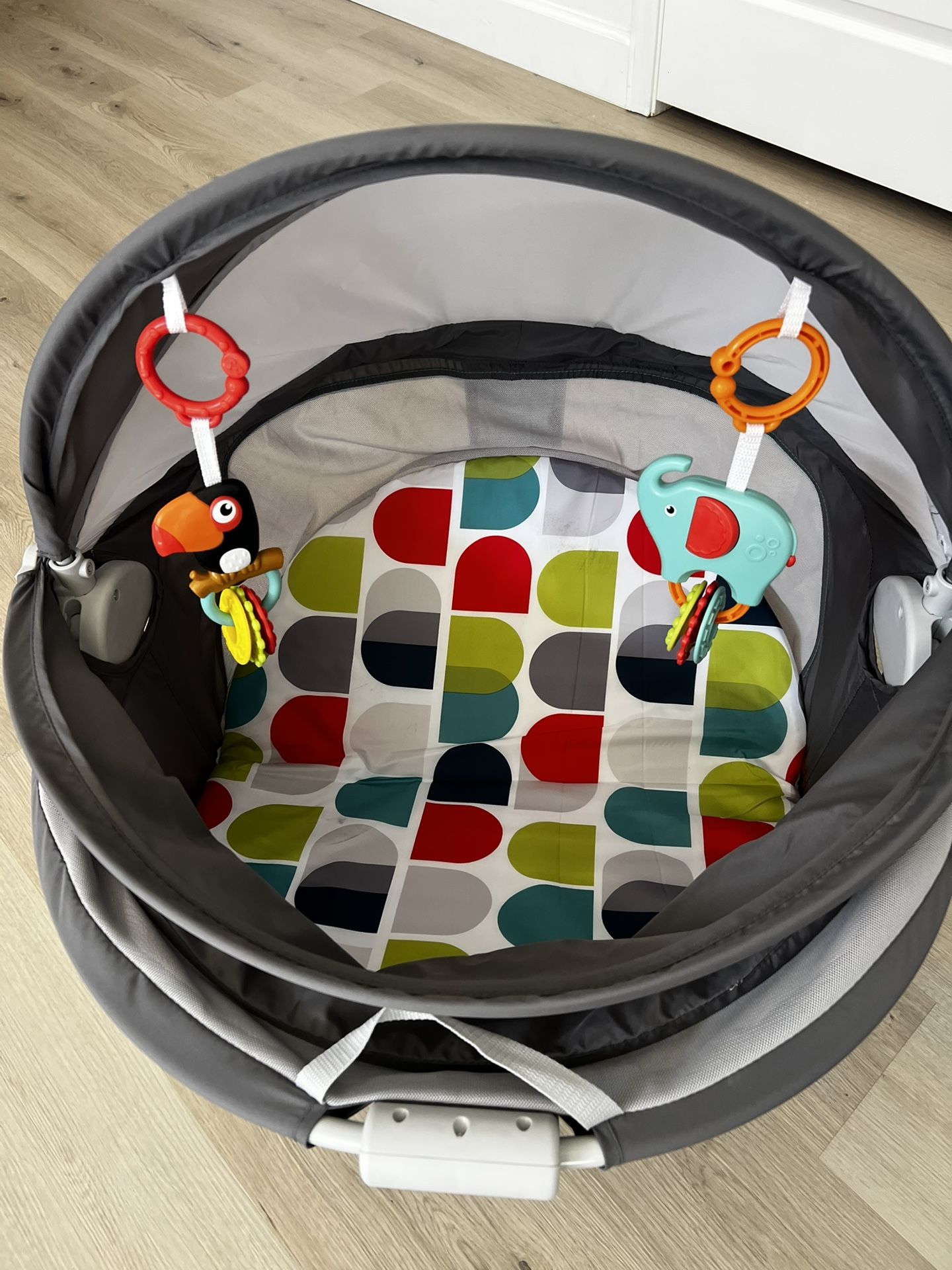 Portable Bassinet On-The-Go Baby Dome, Travel Play Space with Developmental Newborn Toys & Canopy, Windmill