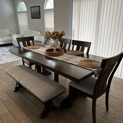 Table, Four Chairs, And Bench