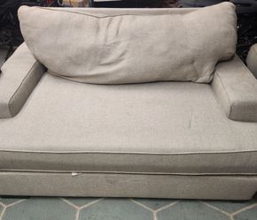Oversized couch with matching ottoman