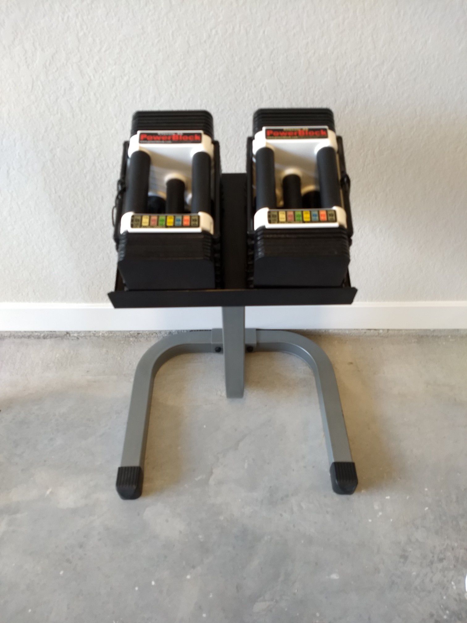 Power Block dumbbells with stand