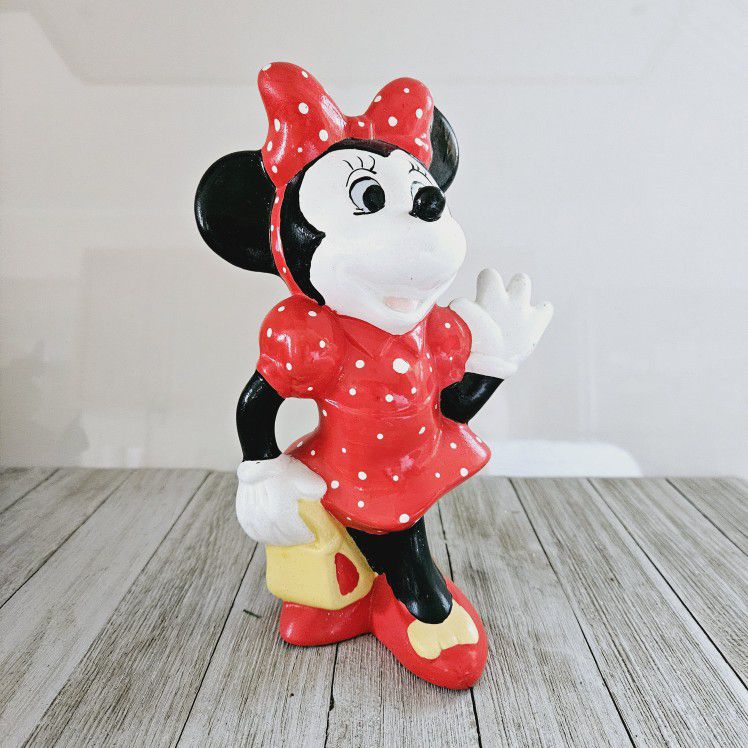 Vintage 1990 8.5" Ceramic Minnie Mouse Hollow Standing Figurine by Walt Disney Productions.

Pre-owned in excellent condition. No chips or cracks ,but
