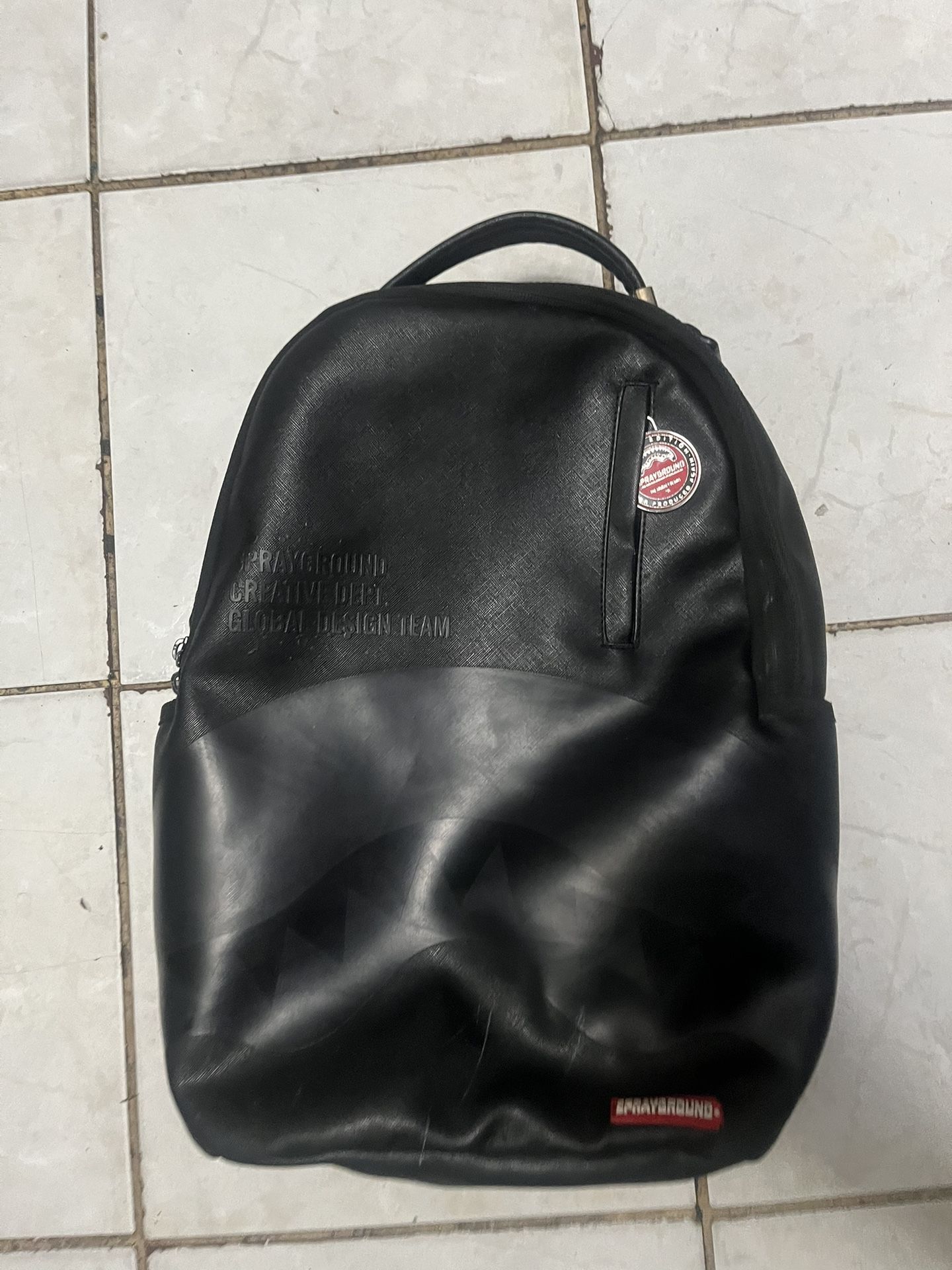 sprayground creative dept global design team backpack