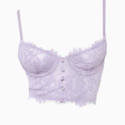 Purple lace corset top with button detail and adjustable straps No size tag but fits s, xs