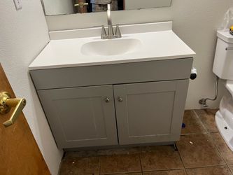 BATHROOM VANITY WITH SINK AND FAUCET $300