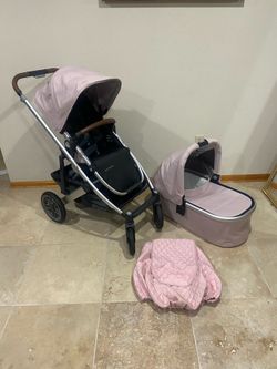 Uppababy Cruz V2 Stroller with Bassinet and Cozy Ganoosh Pink
