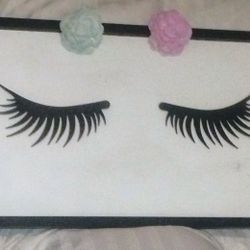 metal eyelashes with flowers on white backing