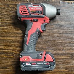 Milwaukee M18 1/4" Hex Impact Driver  With  Red lithium battery. 