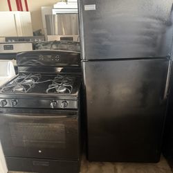 Nice, Black Refrigerator And Black Gas Range