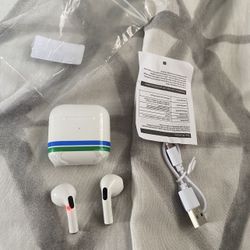 New wireless earbuds. with charger. 