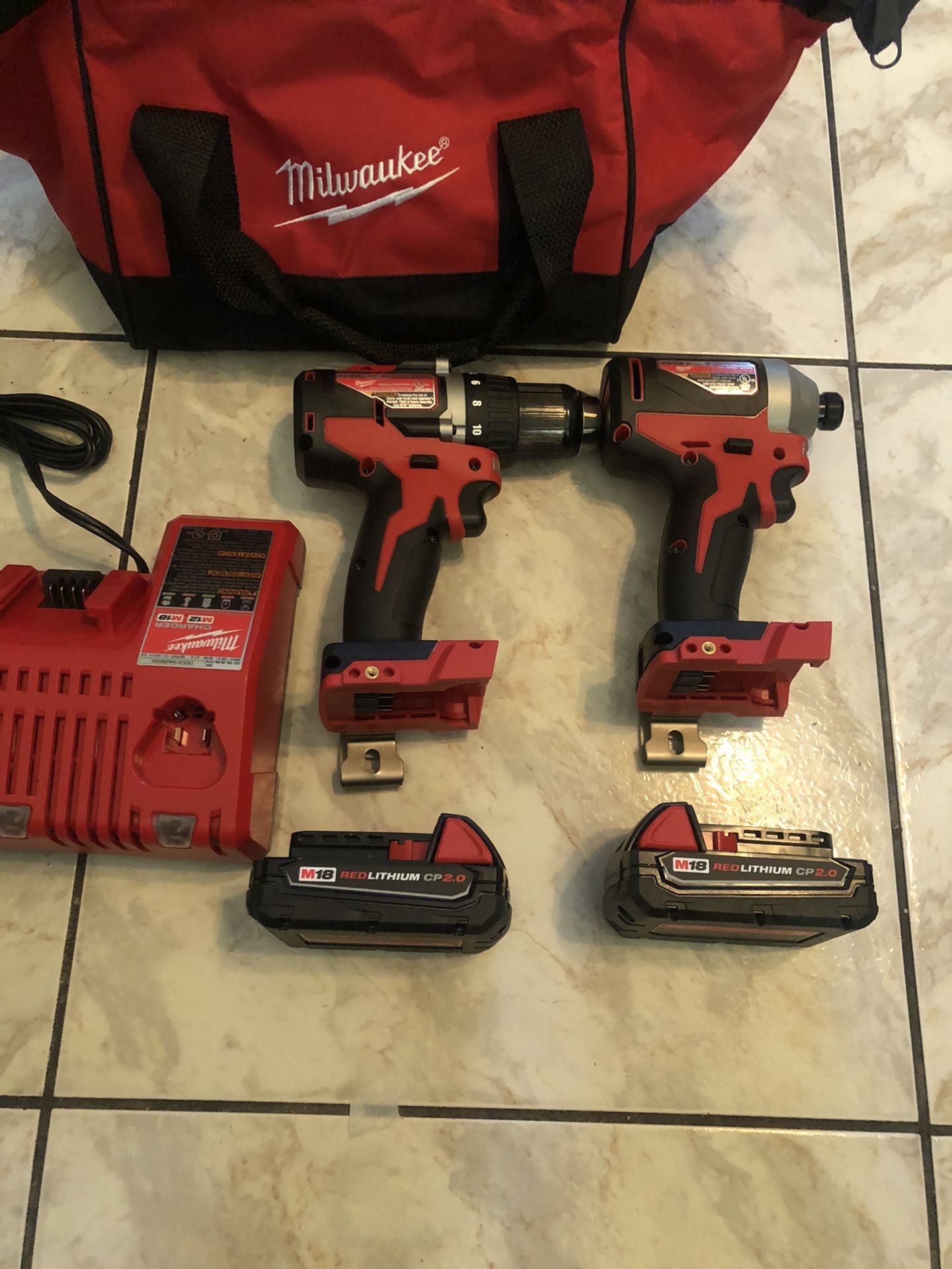 New Milwaukee 18-Volt Lithium-Ion Brushless Cordless Compact Drill/Impact Combo Kit (2-Tool) W/ (2) 2.0Ah Batteries, Charger & Bag $190