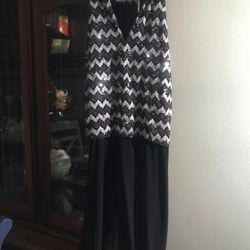 M Multiple dresses black and white is reversible… The sleeveless is a dinner dress and beautiful… $25 each