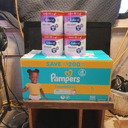 4 Cans Of Formula And 1 Box Of Diapers