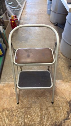 Padded folding step stool