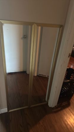 Two golden mirrors