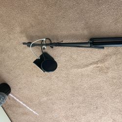 tripod boom microphone stand (folding legs, boom arm, height clutch).