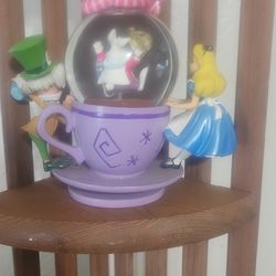 Alice in wonder land tea cup with all the main characters (shaker with glitter)