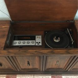 Equipment Entertainment  Solid   State  Console AM/FM   8 Track  Turn Table Askin. $60. Must. Pick Up 