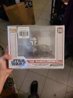Funko Pop The Mandalorian with the child figure
