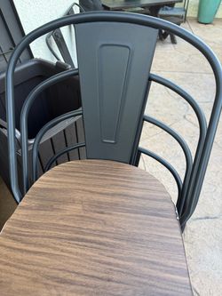 Black metal chairs 4