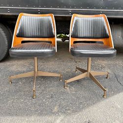 B. Brody Seating Company Swivel pair of Chairs Mid Century Modern.