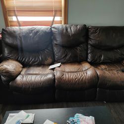 Reclining Couch With Table That Has Power 