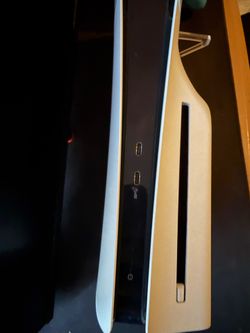 PS5 slim disc with two controllers and charging station