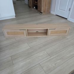 Floating rattan TV mantel