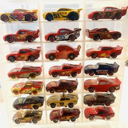 lot of 21 collection features different versions of Lightning McQueen as seen throughout the Cars franchise, including the classic "Rust-eze" look and