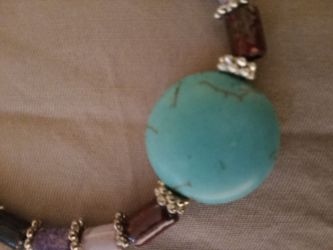 Handmade earth colors silver spacers a size quarter size turquoise stones